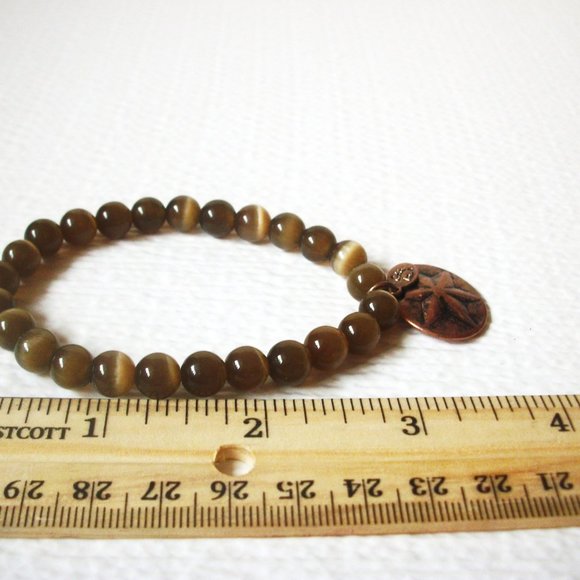 Vintage COOKIE LEE Cat`s Eye Glass Distressed Copper Charm 41517 - Picture 3 of 3